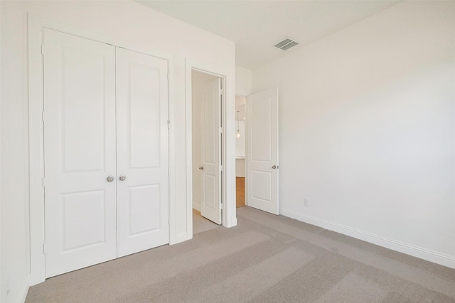 9923 Hunters Run Dr, Missouri City, TX 77459 - unfurnished bedroom with a closet and light colored carpet