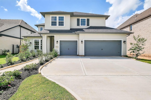 9923 Hunters Run Dr, Missouri City, TX 77459 - view of front of property with stucco siding, concrete driveway, a shingled roof, and a garage