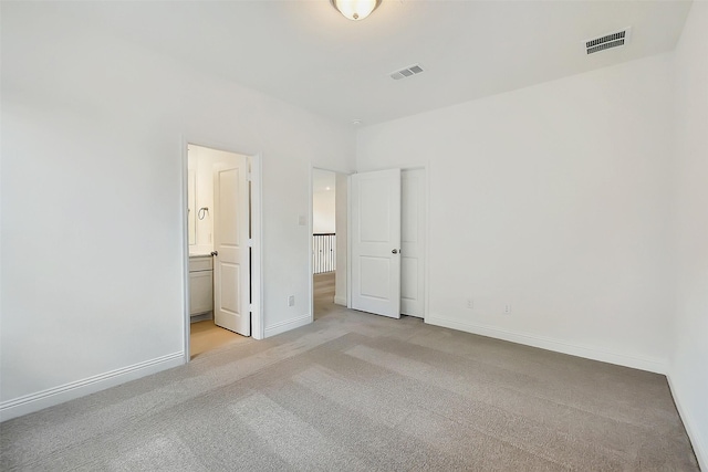 9923 Hunters Run Dr, Missouri City, TX 77459 - unfurnished bedroom with light carpet and ensuite bathroom