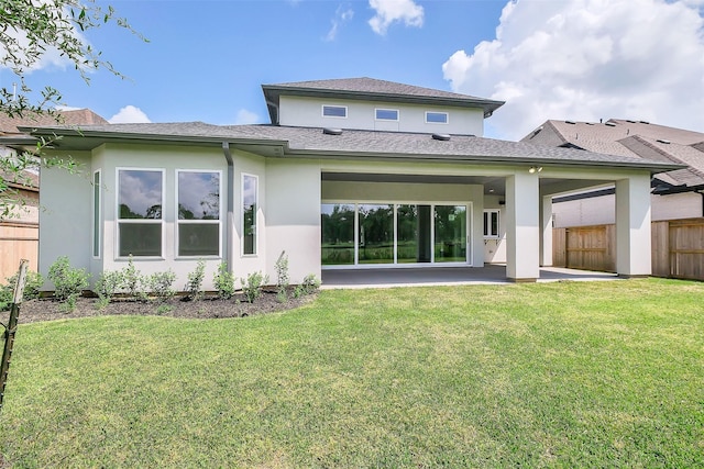 9923 Hunters Run Dr, Missouri City, TX 77459 - rear view of house featuring stucco siding, a patio, and a shingled roof