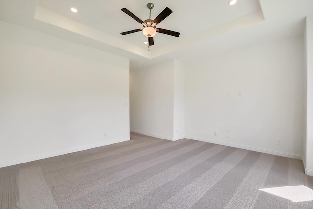 9923 Hunters Run Dr, Missouri City, TX 77459 - carpeted empty room with a tray ceiling, recessed lighting, and a ceiling fan