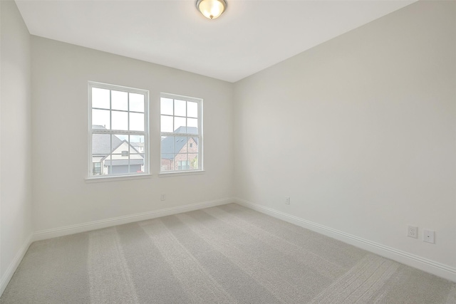 9923 Hunters Run Dr, Missouri City, TX 77459 - spare room with baseboards and light carpet