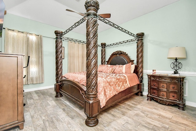 bedroom featuring ceiling fan and hardwood / wood-style floors