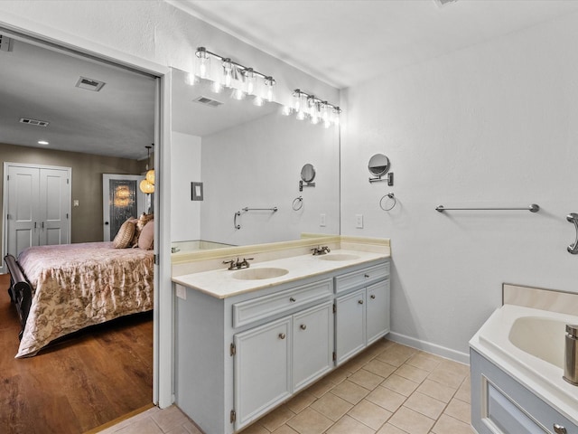 bathroom featuring vanity and tile patterned floors