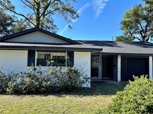 ranch-style house with a front yard