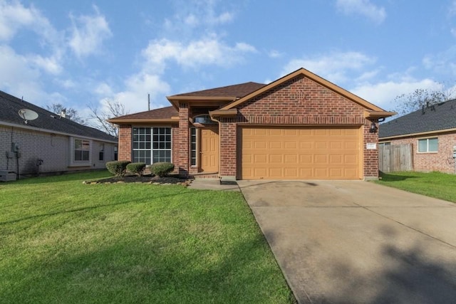 view of front of house with a front lawn and a garage