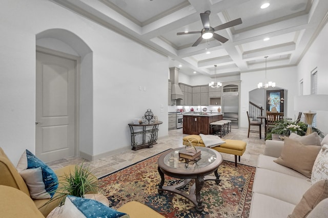 living area with recessed lighting, coffered ceiling, a towering ceiling, beamed ceiling, and ceiling fan with notable chandelier