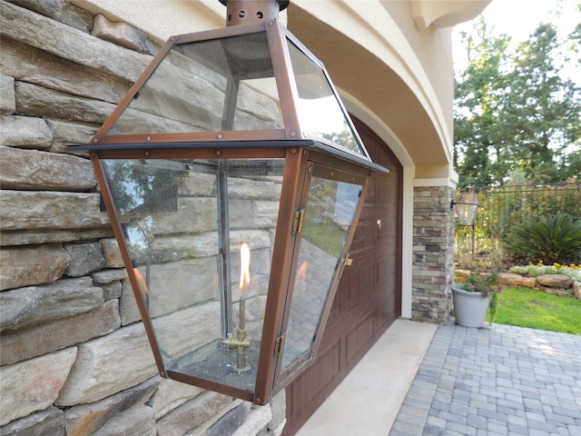 view of exterior entry with stone siding