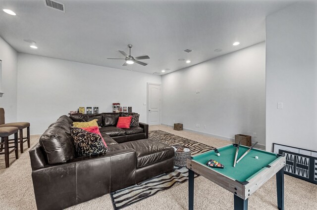 rec room with carpet flooring and ceiling fan