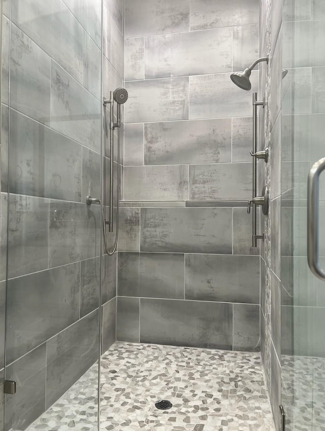 bathroom with a stall shower