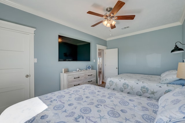 bedroom with ceiling fan and ornamental molding