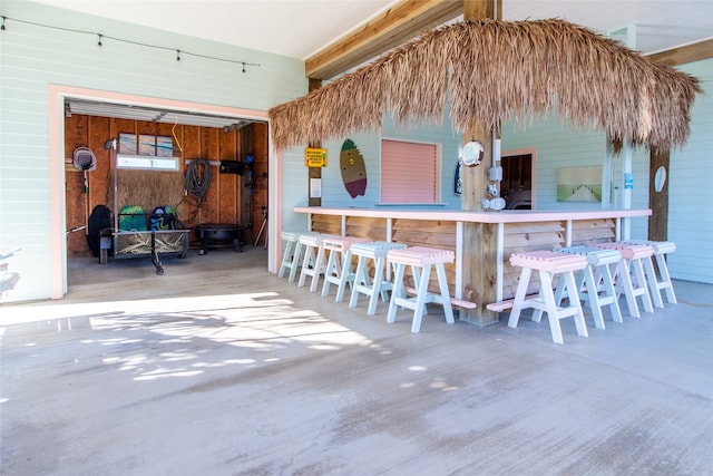 view of patio featuring a bar