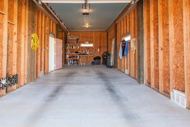 garage with a workshop area