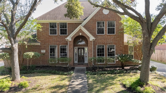 view of front facade with a front yard