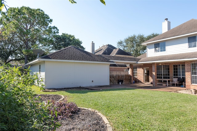 exterior space with a yard and a patio