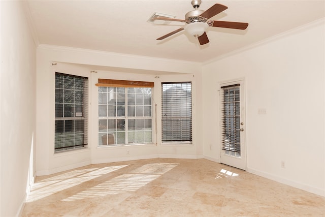 unfurnished room featuring ceiling fan and crown molding