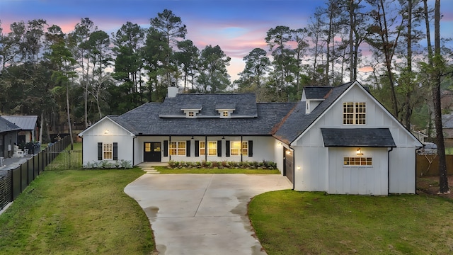 view of front of home with a yard