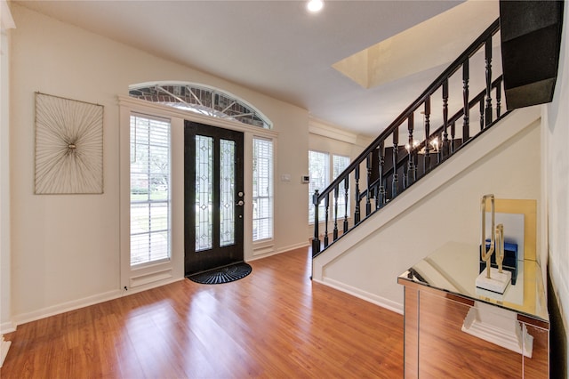 foyer entrance with hardwood / wood-style floors