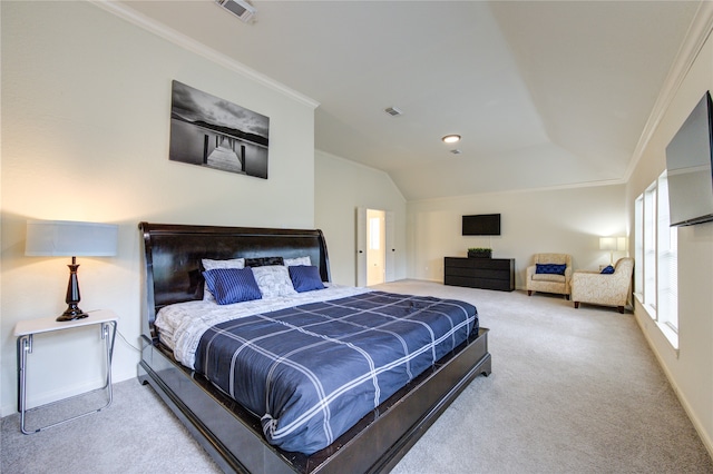 bedroom featuring ornamental molding, carpet floors, and vaulted ceiling