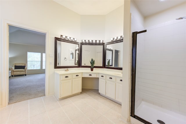 bathroom with vanity and walk in shower