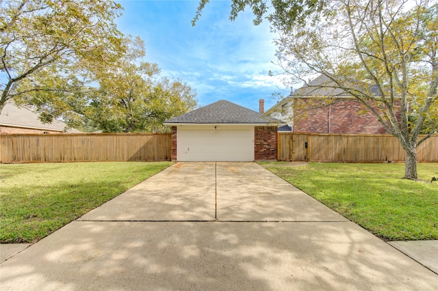 exterior space featuring a front yard and a garage