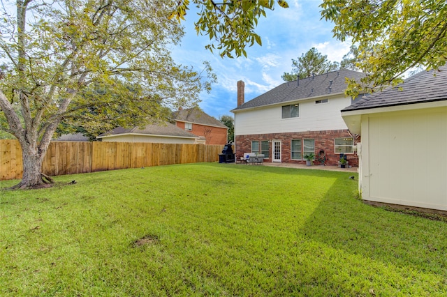 view of yard with a patio area