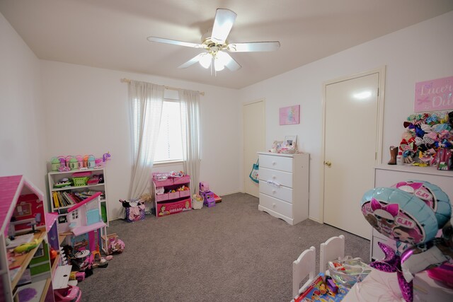 recreation room featuring carpet flooring and ceiling fan