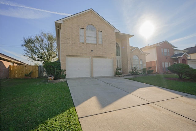 front of property with a garage and a front lawn