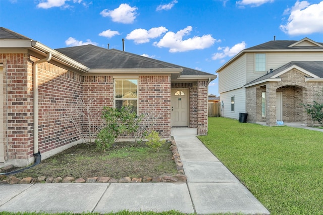 view of front of home with a front yard