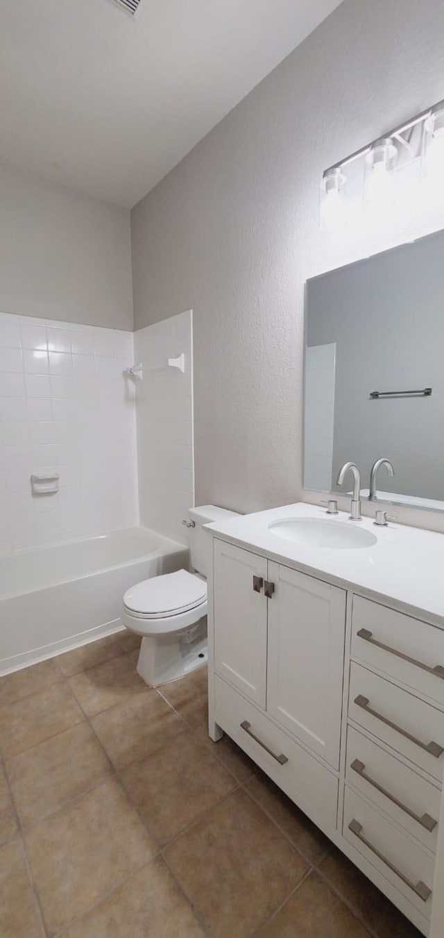 full bathroom featuring tile patterned floors, vanity, toilet, and tub / shower combination