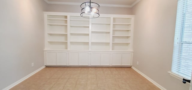 unfurnished dining area featuring crown molding, light tile patterned floors, and a chandelier