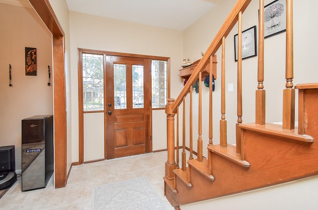 foyer with light tile patterned floors