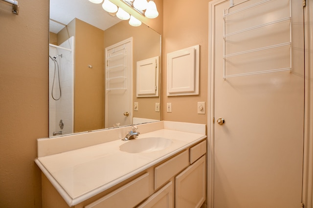 bathroom featuring vanity and walk in shower