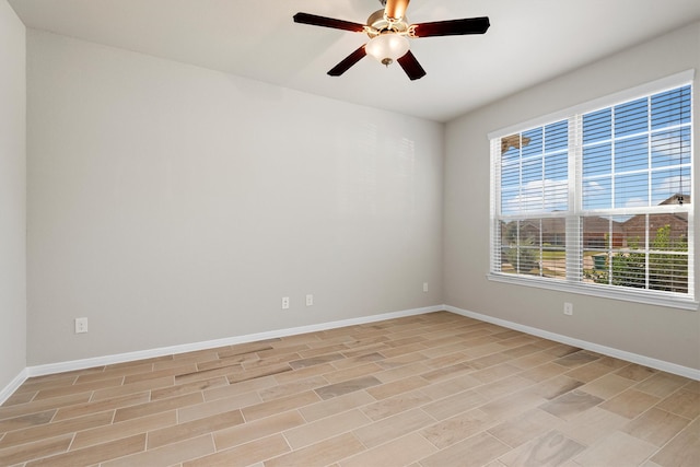 unfurnished room featuring ceiling fan and light hardwood / wood-style flooring