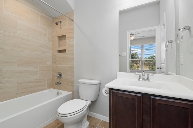 full bathroom featuring vanity, ceiling fan, hardwood / wood-style flooring, toilet, and tiled shower / bath