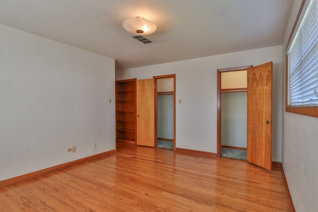 unfurnished bedroom with light hardwood / wood-style flooring