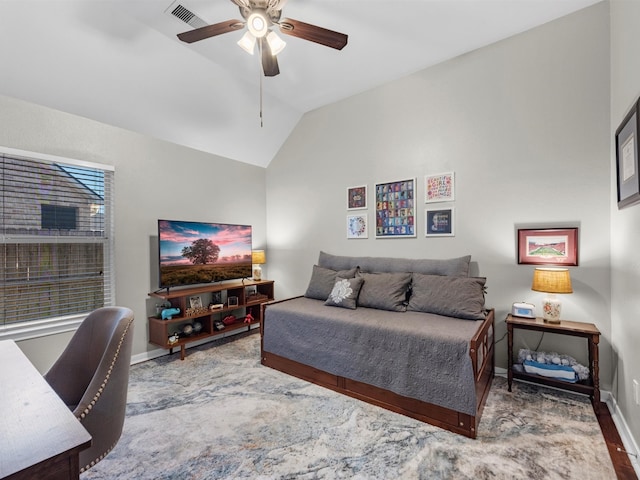 bedroom featuring hardwood / wood-style flooring, ceiling fan, and vaulted ceiling