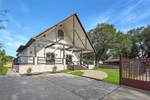 exterior space with a front yard and a porch