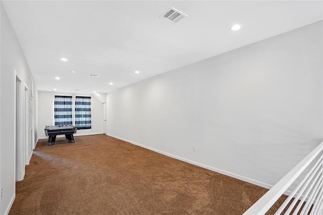 carpeted spare room with pool table