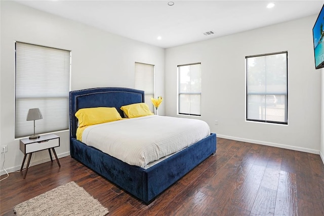 bedroom featuring dark wood-type flooring