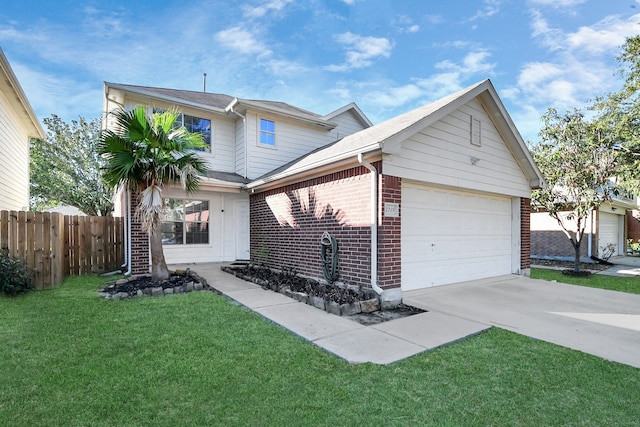 view of front of home featuring a garage and a front yard