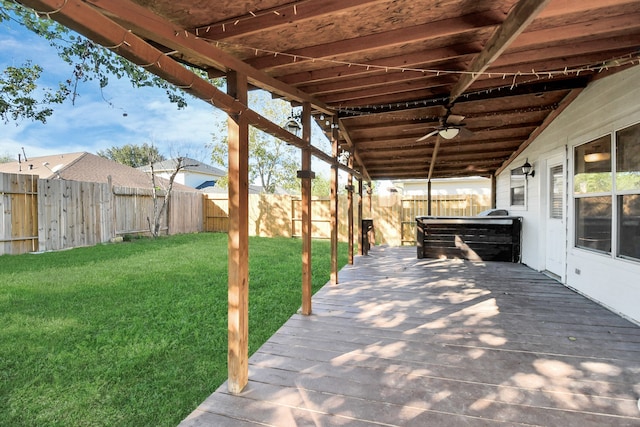 view of patio featuring ceiling fan and a deck