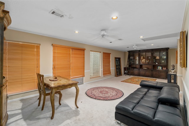 living room featuring ceiling fan and carpet floors