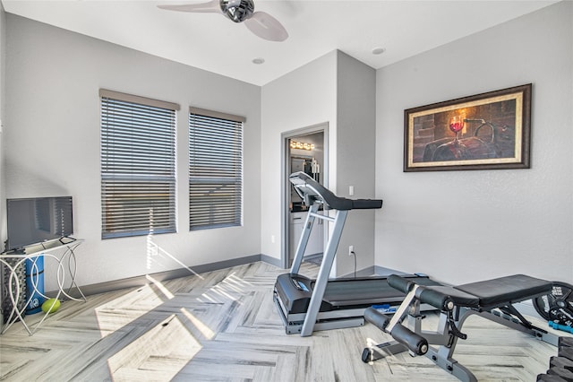 exercise room with ceiling fan