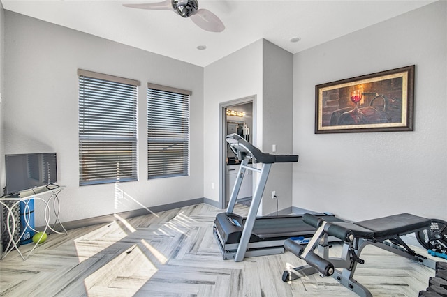 3709 Rice St, Galveston, TX 77554 - workout area featuring baseboards and a ceiling fan