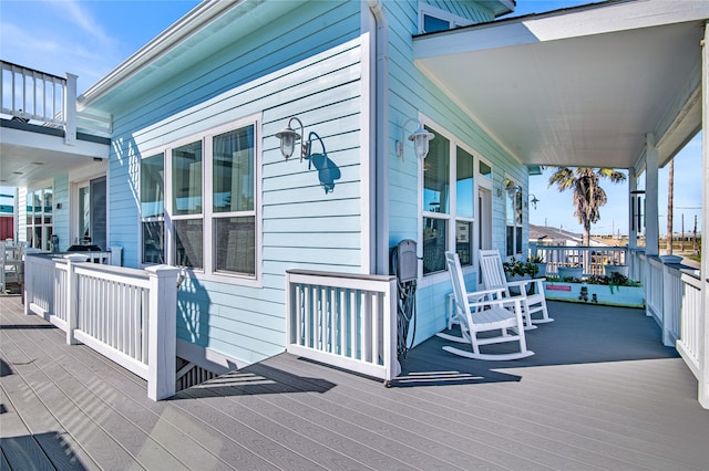 wooden terrace with covered porch