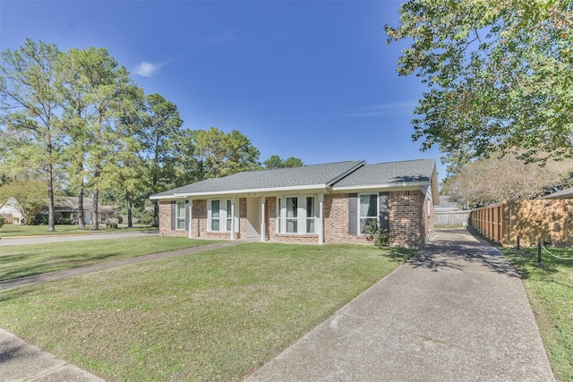 single story home with a front yard and a porch