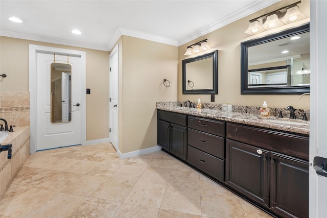 bathroom featuring vanity, a relaxing tiled tub, tile patterned floors, and ornamental molding