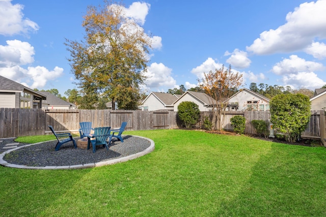 view of yard featuring a fire pit