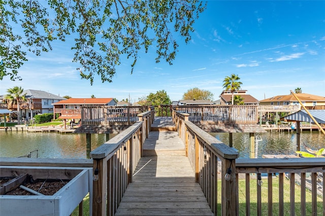 dock area featuring a water view